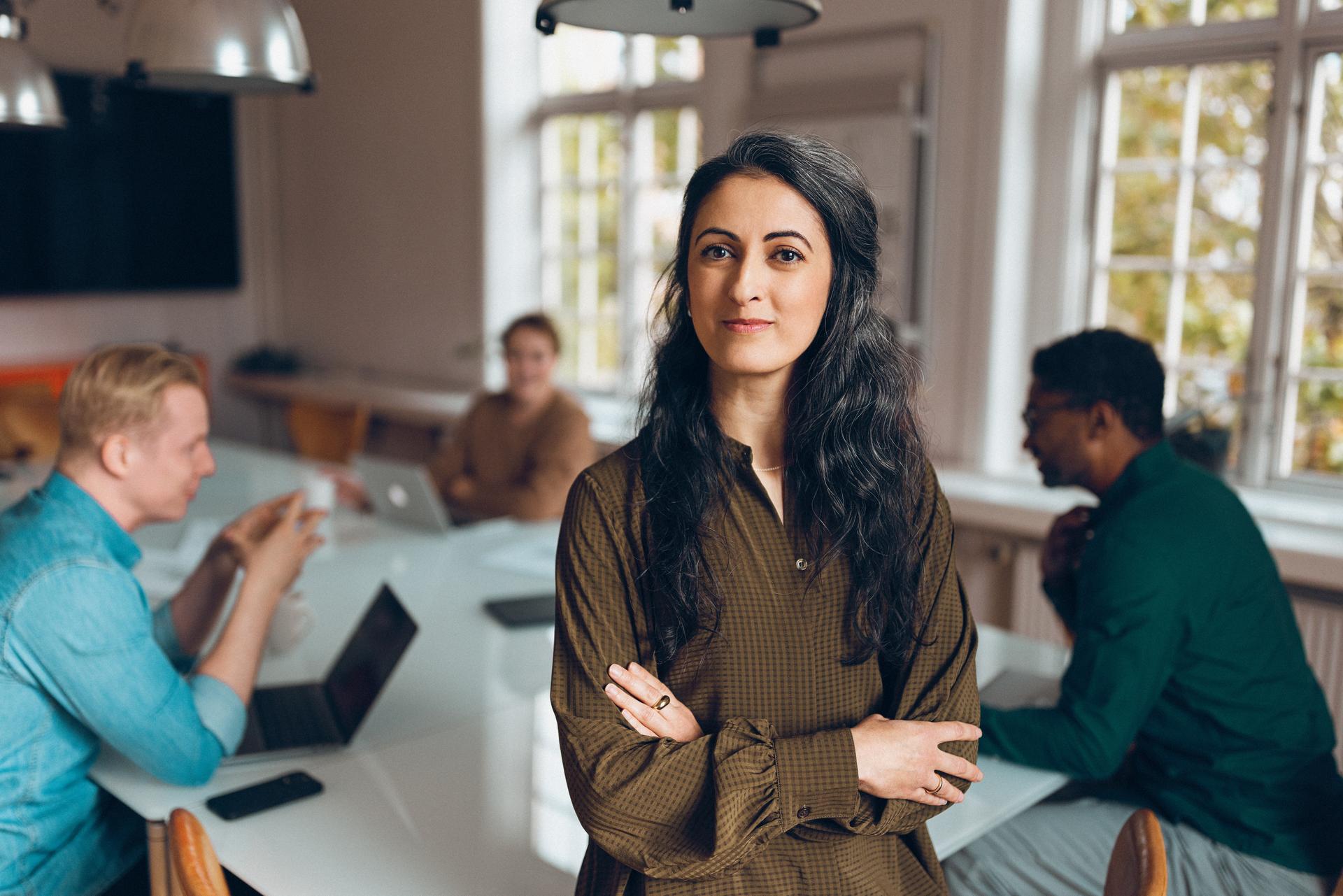 woman standing in a meeting room