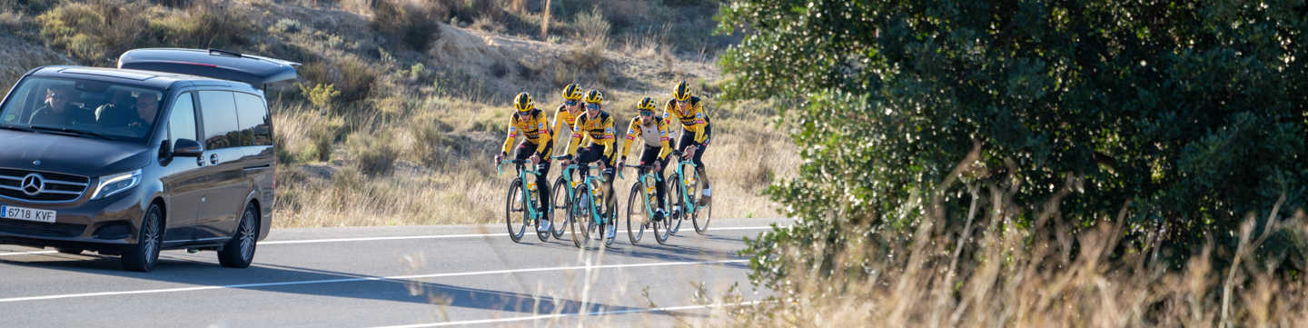 The team Jumbo-Visma riders cycling on the road