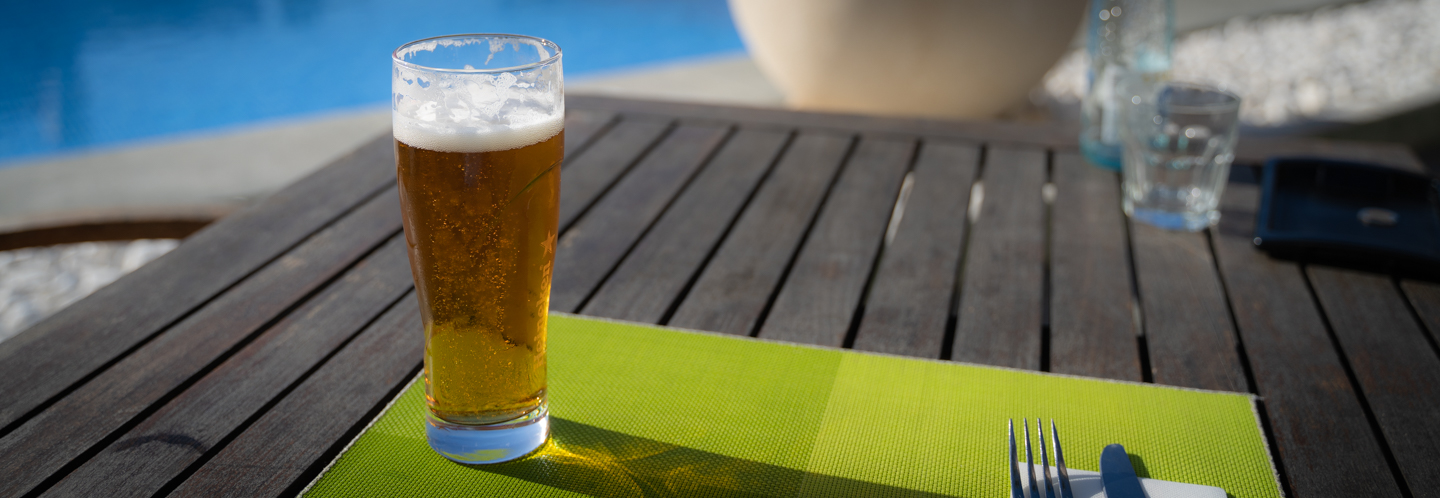 Picture of a beer glass in the sun