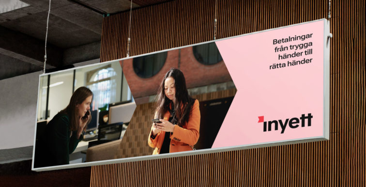 A street advertisement showing the Inyett flag used in an expressive way