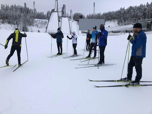 Visma employees participating in a ski session