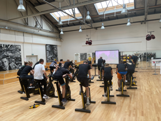 The Visma e-conomic employees during a spinning class led by one of the pro riders of Team Jumbo-Visma: Anouska Koster.